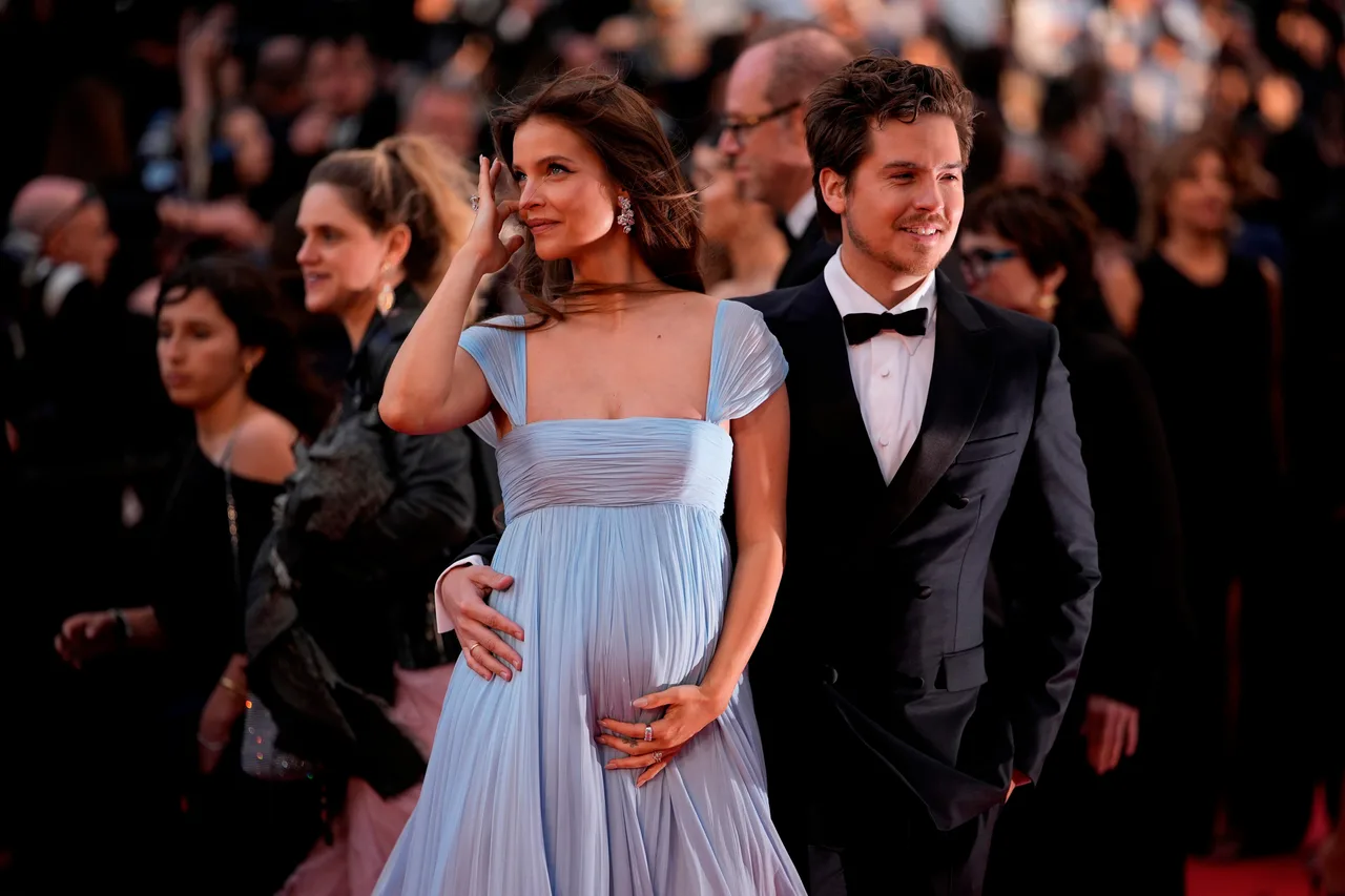 Barbara Palvin flaunts her cute baby bump in light blue gown