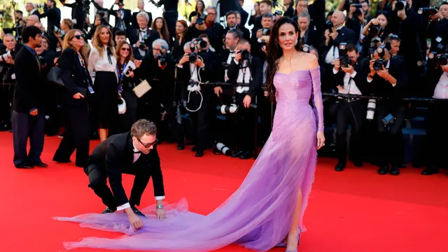 Demi Moore stuns the red carpet in purple Gucci gown on second day of Cannes 2026