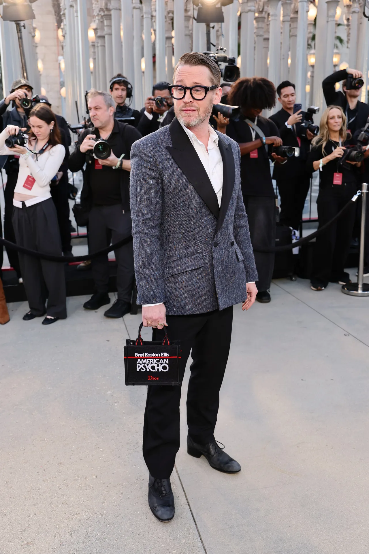 Macaulay Culkin attends the Dior Cruise 2027 show