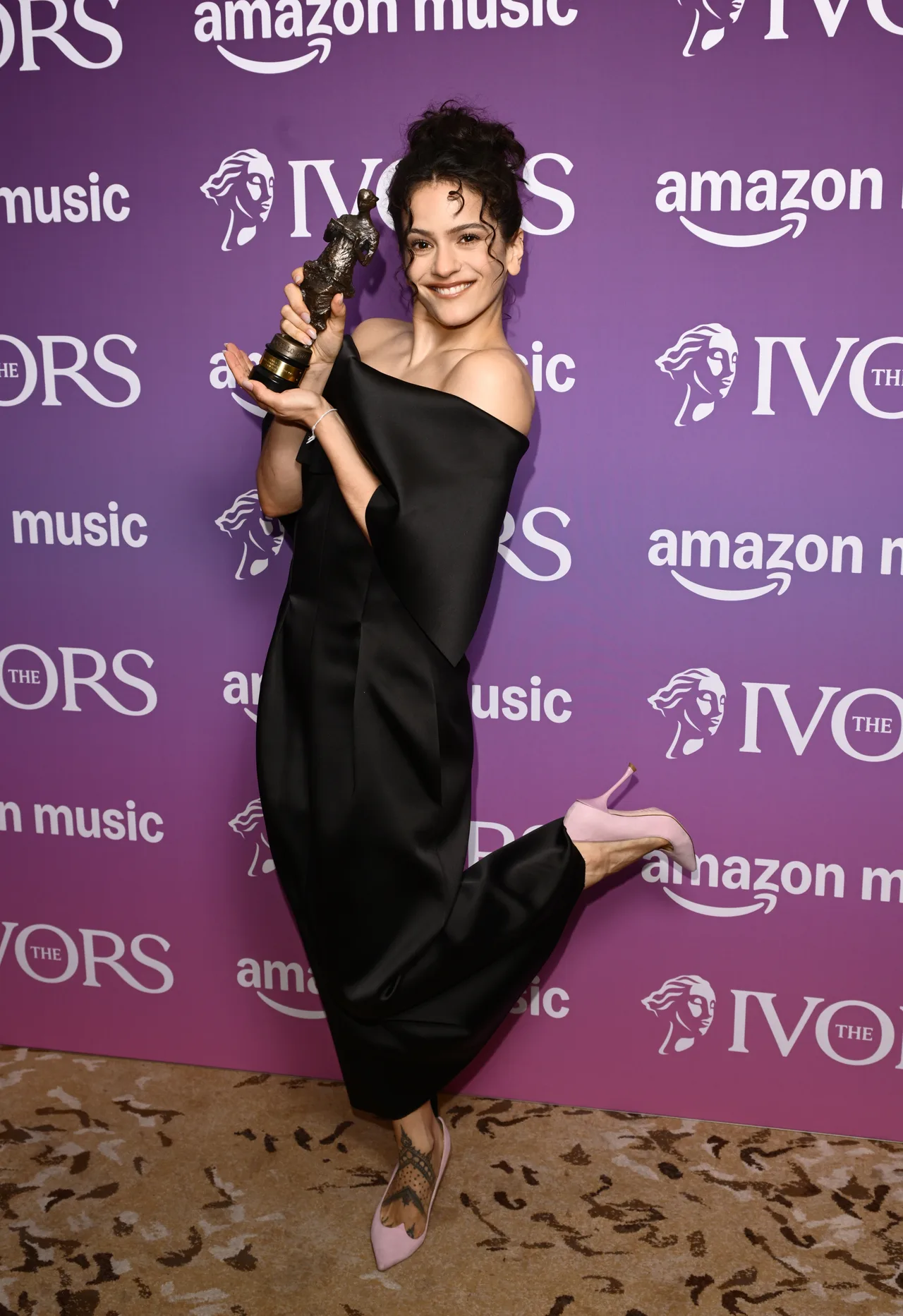 Rosalia serves effortless elegance in off-shoulder glam at Ivor Novello Awards