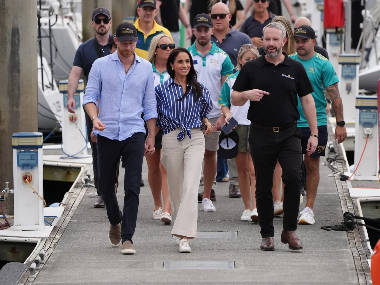 Meghan Markle and Prince Harry after sailing event with Invictus members in Sydney