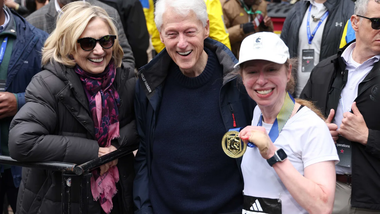 Bill and Hillary Clinton cheer daughter Chelsea at Boston Marathon in rare appearance