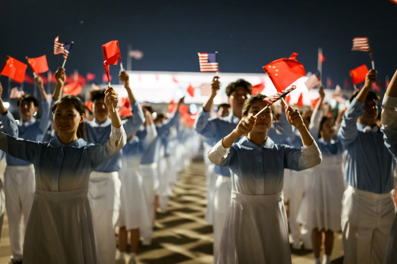 Students wave flags for Trump