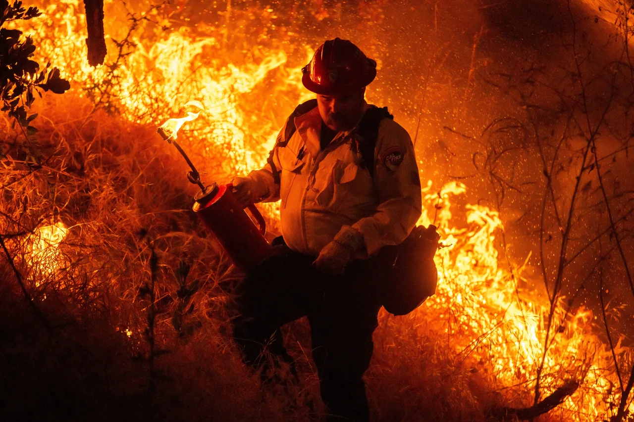 A brave fireman tries to control massive fire