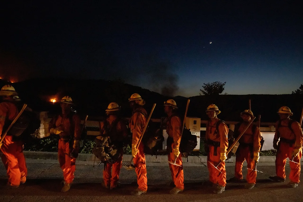 An inmate crew boards their vehicle after battling fire bravely