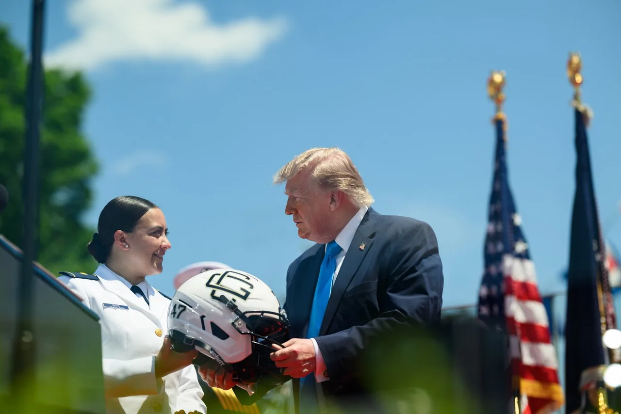Trump presented with a Coast Guard football helmet