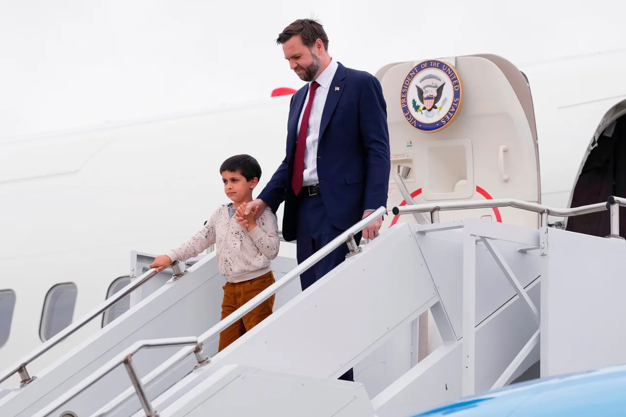 JD Vance arrives with son Vivek in Iowa