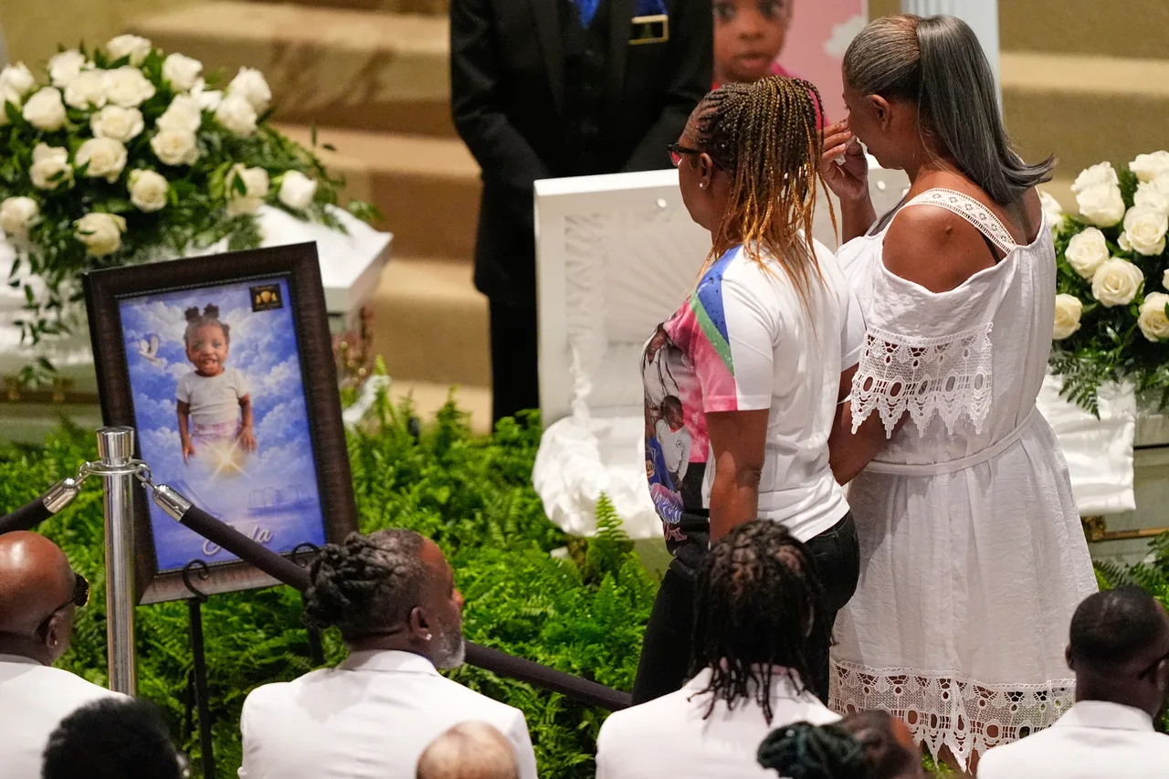 White caskets and touching tributes