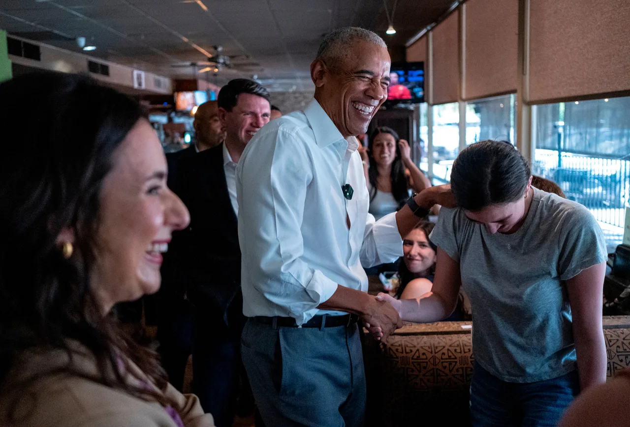 Obama flashes his signature charm while greeting Austin voters