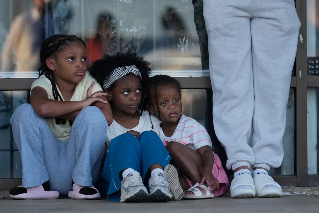 Children gather in prayer vigil
