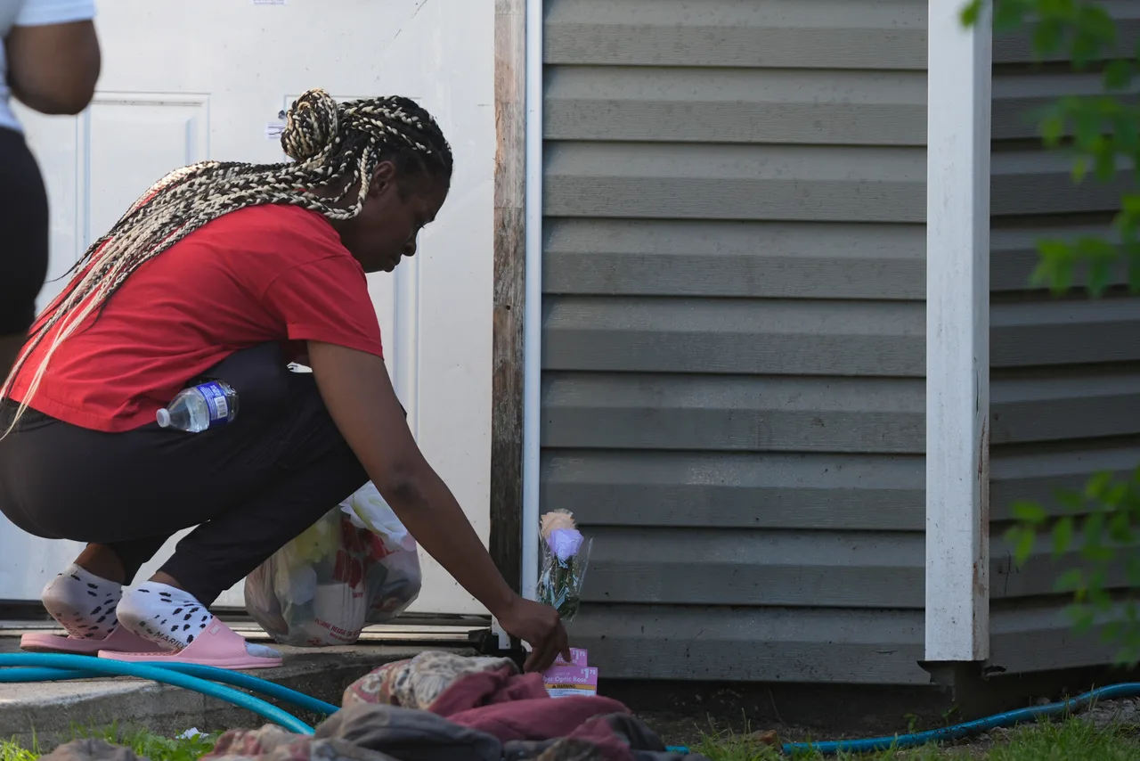 Flowers left in tribute outside home