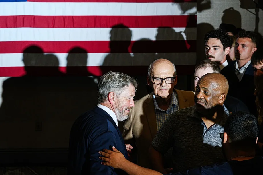 Rep. Thomas Massie, R-Ky., speaks with attendees during an election night watch party after losing the Republican party's nomination