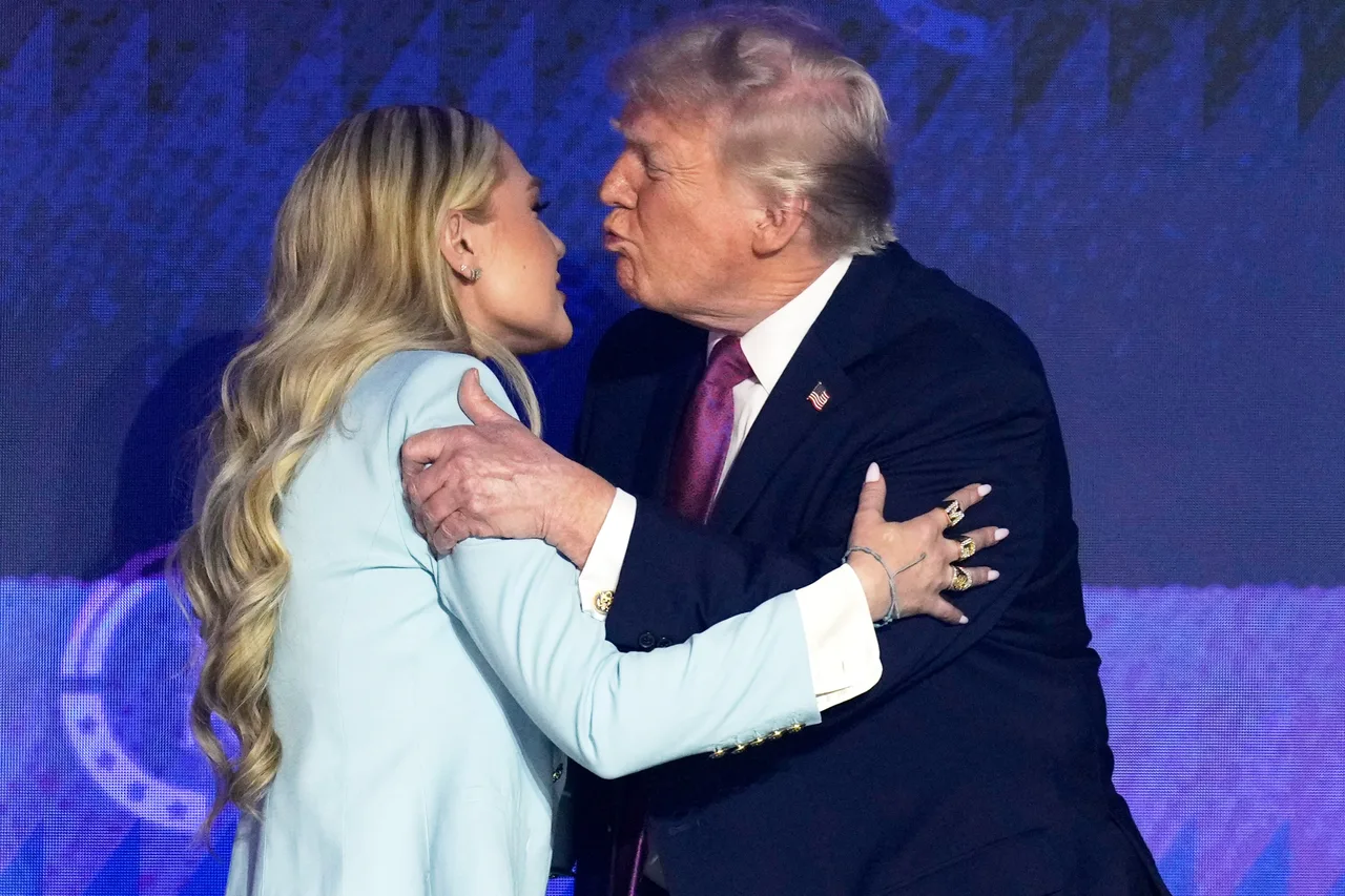 Trump leans in to greet Erika Kirk