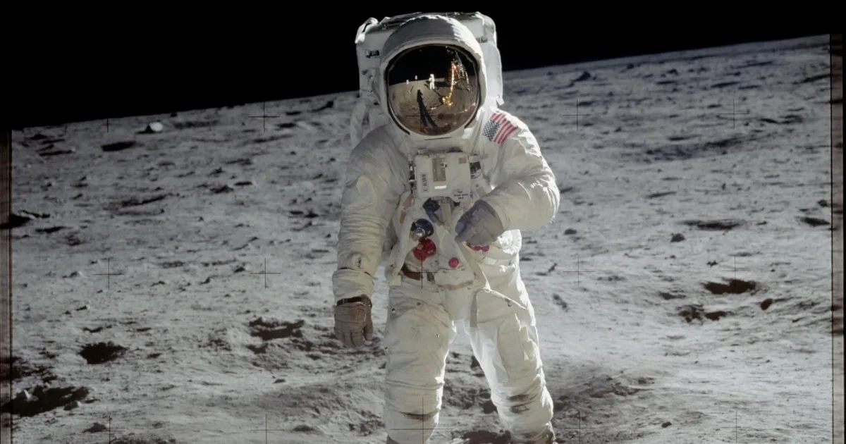 Neil Armstrong hiding in Buzz Aldrin’s golden visor