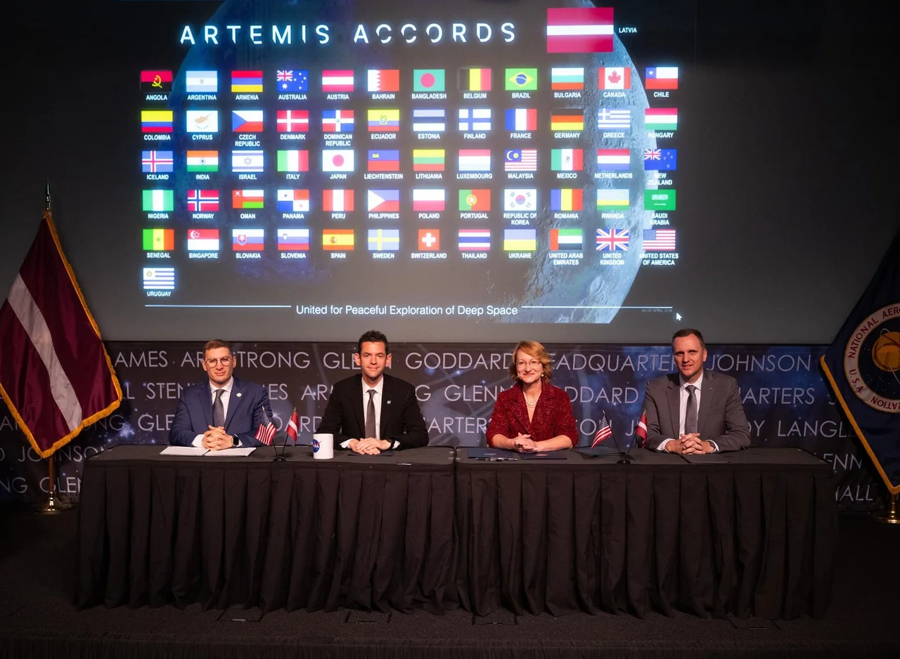Dignitaries from the US and Latvia seated at the Artemis Accords event