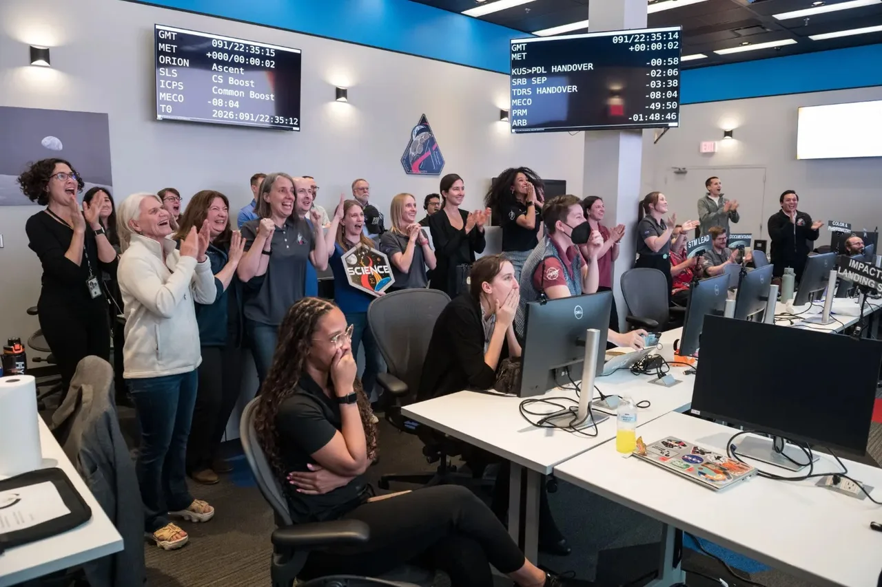 Scientists in the Science Evaluation Room (SER) watching the Artemis II crew to become the first humans to fly around the Moon in over 50 years