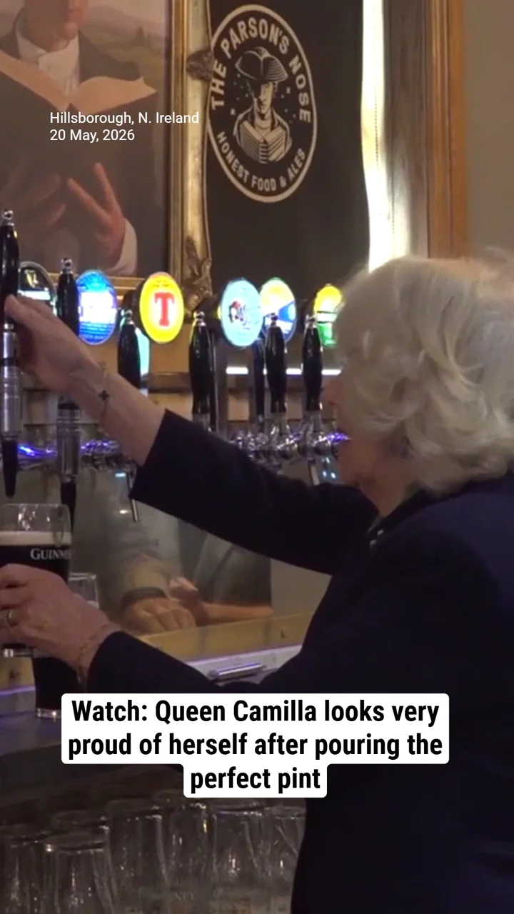 Watch: Queen Camilla looks very proud of herself after pouring the perfect pint