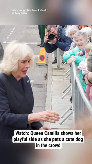 Watch: Queen Camilla shows her playful side as she pets a cute dog in the crowd