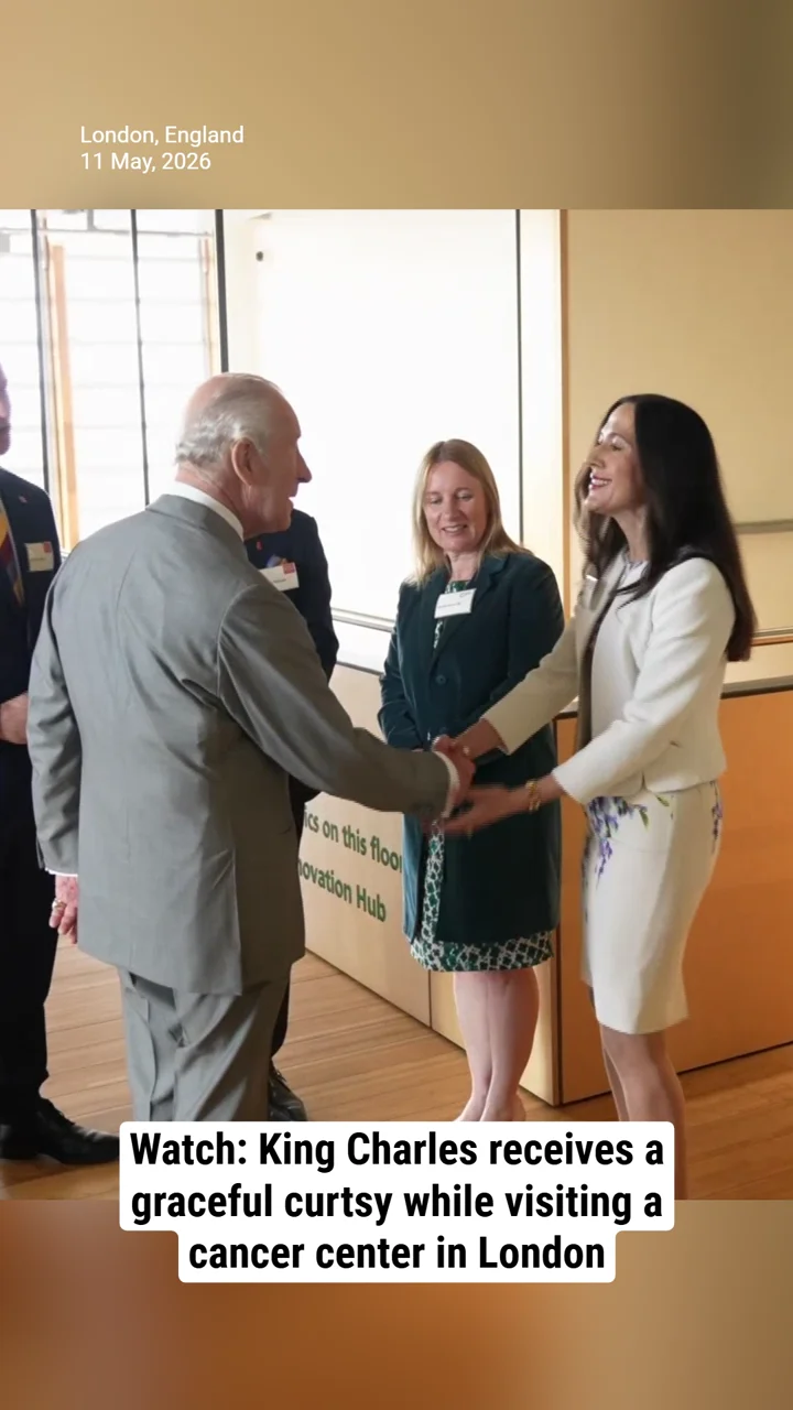 Watch: King Charles receives a graceful curtsy while visiting a cancer center in London