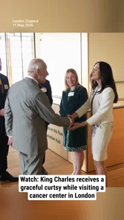Watch: King Charles receives a graceful curtsy while visiting a cancer center in London