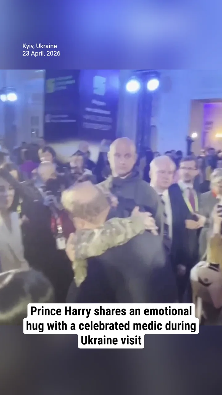 Prince Harry shares an emotional hug with a celebrated medic during Ukraine visit