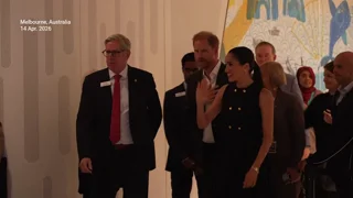 Prince Harry and Meghan Markle arrive at a children's hospital on Day 1 of privately-funded Australia trip