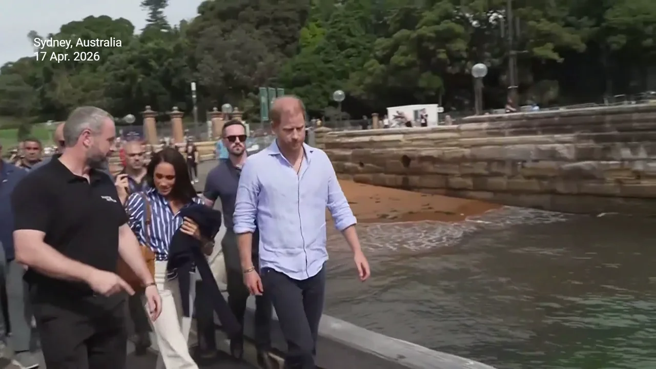 Watch Prince Harry show his gentleman side as he helps Meghan Markle board a boat