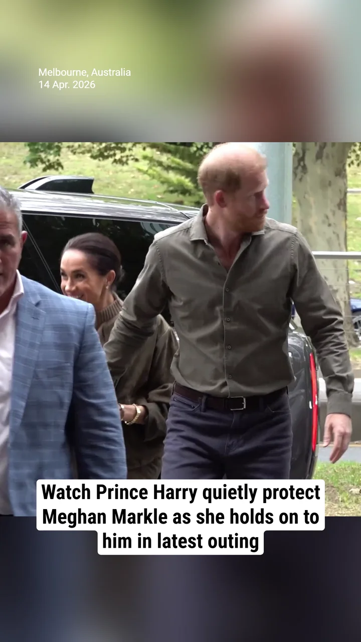 Watch Prince Harry quietly protect Meghan Markle as she holds on to him in latest outing