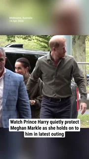 Watch Prince Harry quietly protect Meghan Markle as she holds on to him in latest outing
