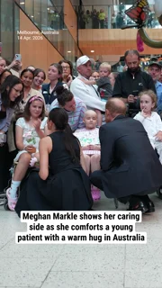 Meghan Markle shows her caring side as she comforts a young patient with a warm hug in Australia