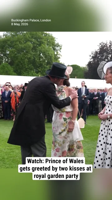 Watch: Prince of Wales gets greeted by two kisses at royal garden party