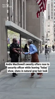 Andie MacDowell sweetly offers rose to security officer while leaving 'Today' show, stuns in natural gray hair look