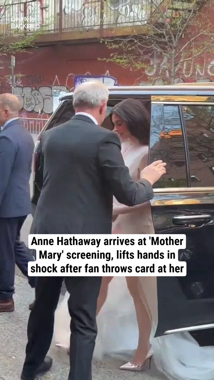 Anne Hathaway arrives at 'Mother Mary' screening, lifts hands in shock after fan throws card at her
