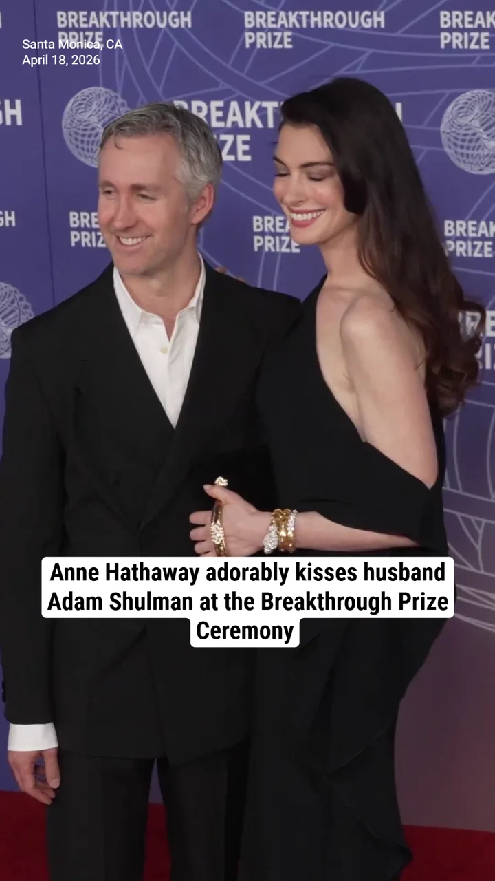 Anne Hathaway adorably kisses husband Adam Shulman at the Breakthrough Prize Ceremony