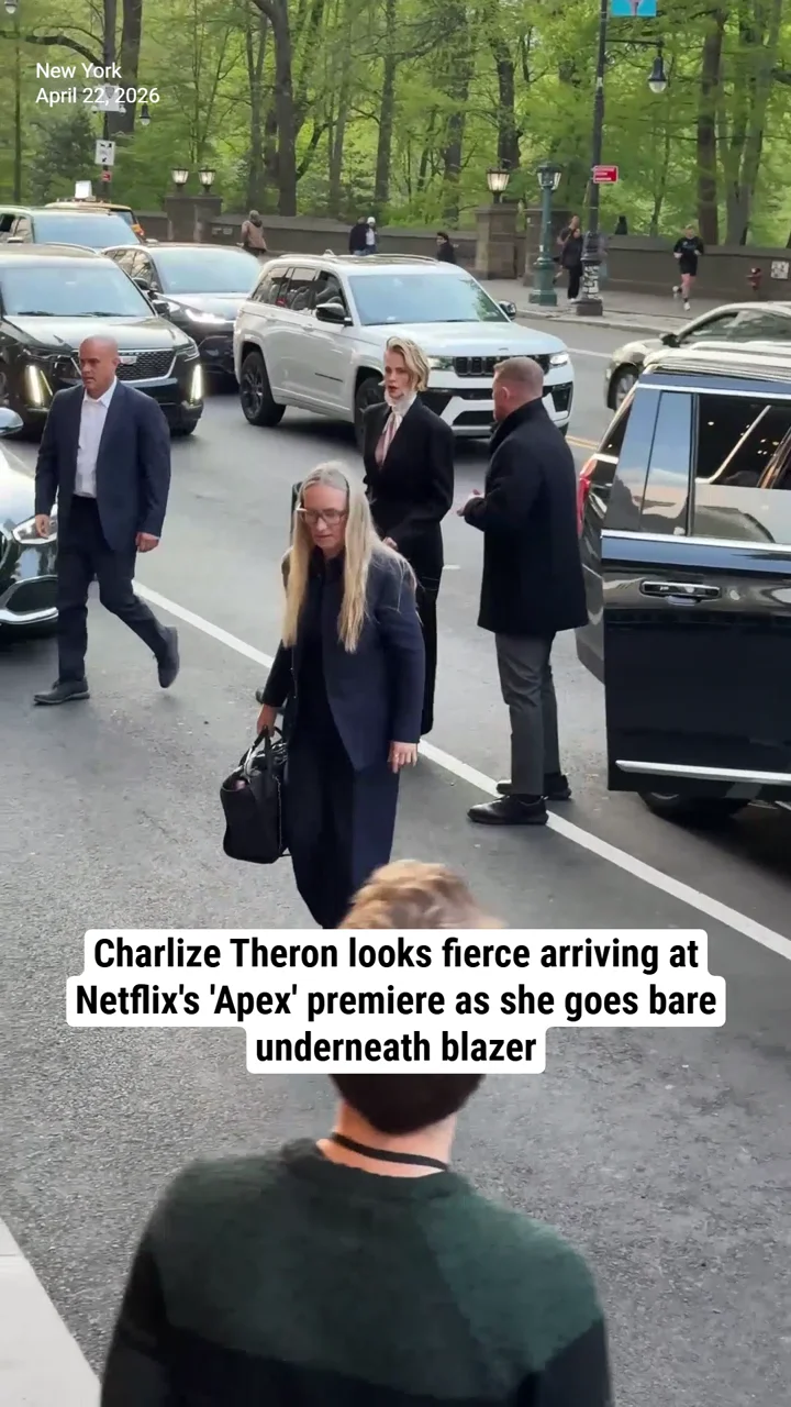 Charlize Theron looks fierce arriving at Netflix's 'Apex' premiere as she goes bare underneath blazer