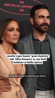 Jennifer Lopez boasts “great chemistry” with ‘Office Romance’ co-star Brett Goldstein at Netflix Upfront