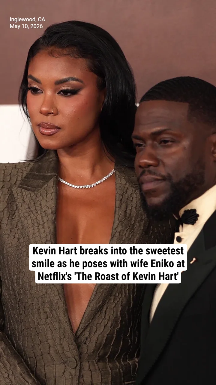 Kevin Hart breaks into the sweetest smile as he poses with wife Eniko at Netflix's 'The Roast of Kevin Hart'