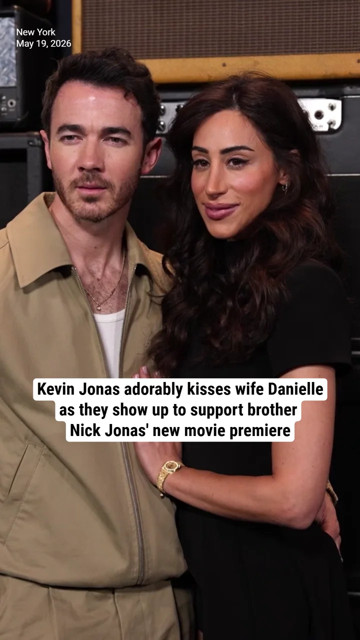 Kevin Jonas adorably kisses wife Danielle as they show up to support brother Nick Jonas' new movie premiere