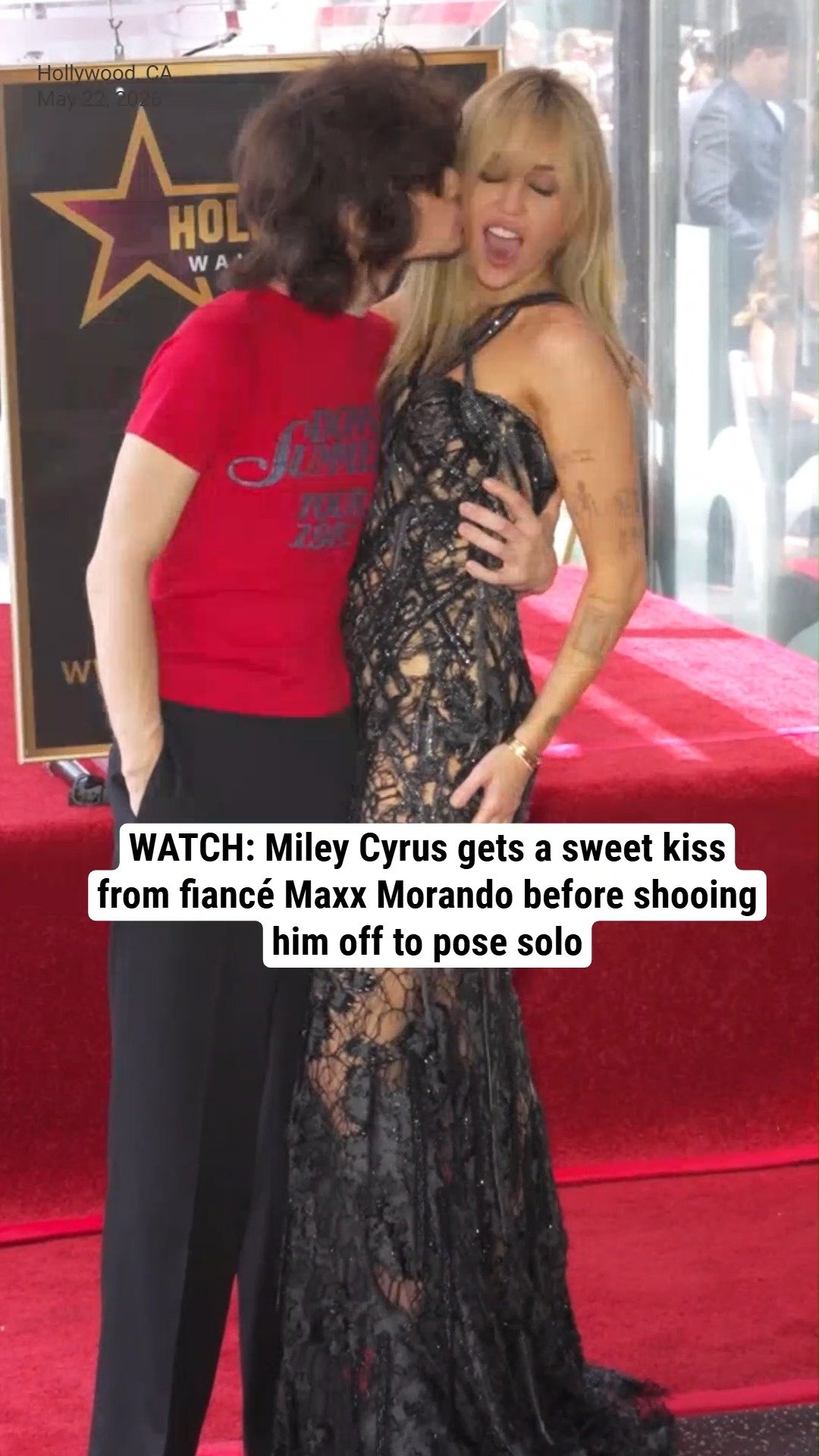 WATCH: Miley Cyrus gets a sweet kiss from fiancé Maxx Morando before shooing him off to pose solo