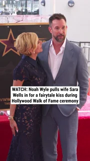 WATCH: Noah Wyle pulls wife Sara Wells in for a fairytale kiss during Hollywood Walk of Fame ceremony