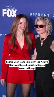 Sophia Bush leans into girlfriend Ashlyn Harris on the red carpet, whispers sweet nothings