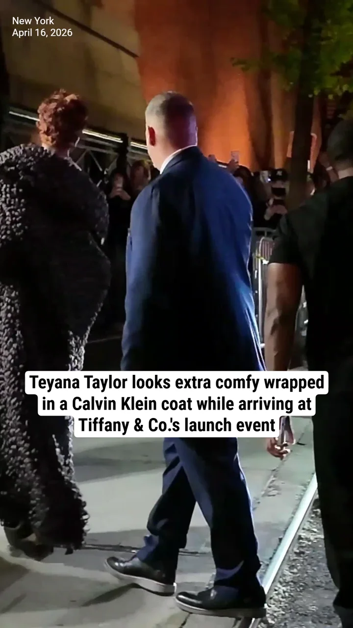Teyana Taylor looks extra comfy wrapped in a Calvin Klein coat while arriving at Tiffany & Co.'s launch event