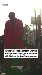 Tyrese Gibson is a Smooth Criminal in red as he gets hands-on with Michael Jackson mannequins