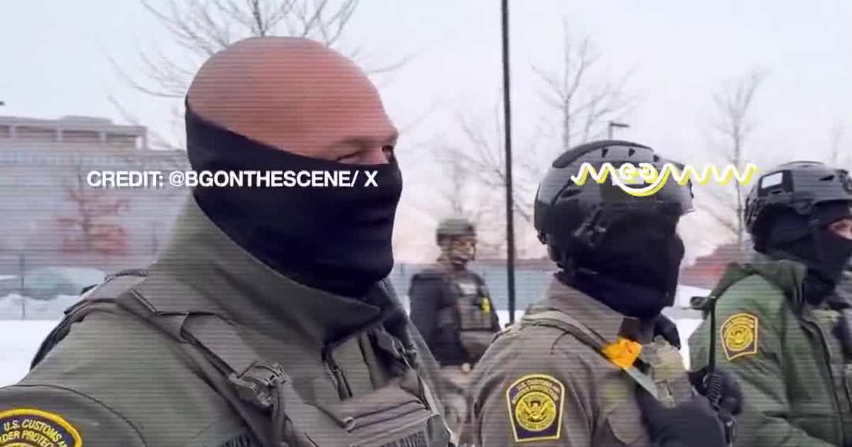 'We Have a Heart': Border Patrol Agent Hugs Minneapolis Protester Outside ICE Facility