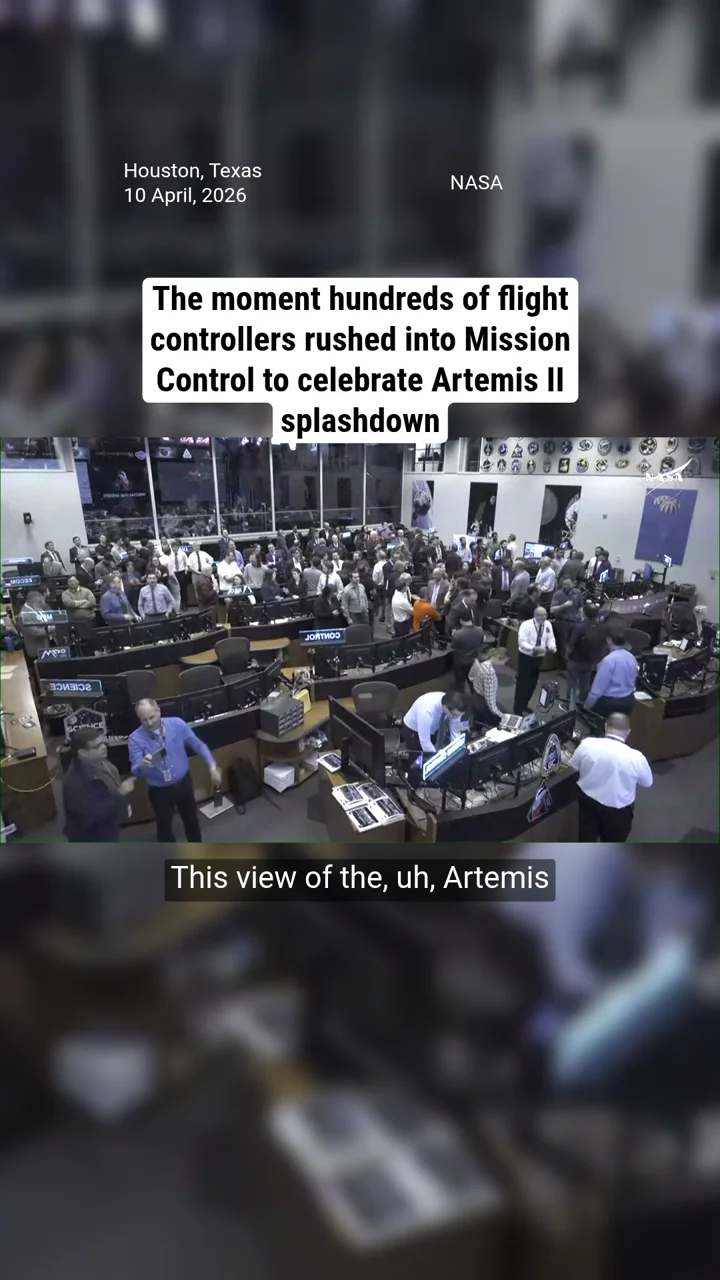 The moment hundreds of flight controllers rushed into Mission Control to celebrate Artemis II splashdown