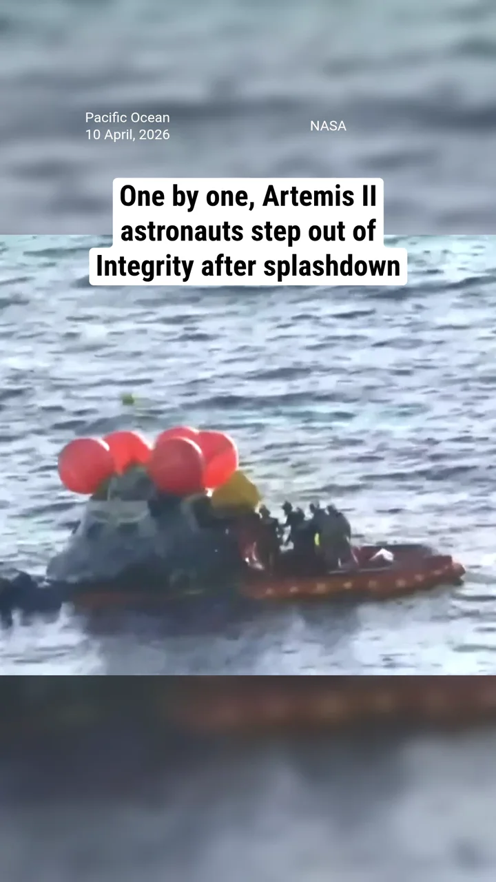 One by one, Artemis II astronauts step out of Integrity after splashdown