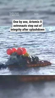 One by one, Artemis II astronauts step out of Integrity after splashdown
