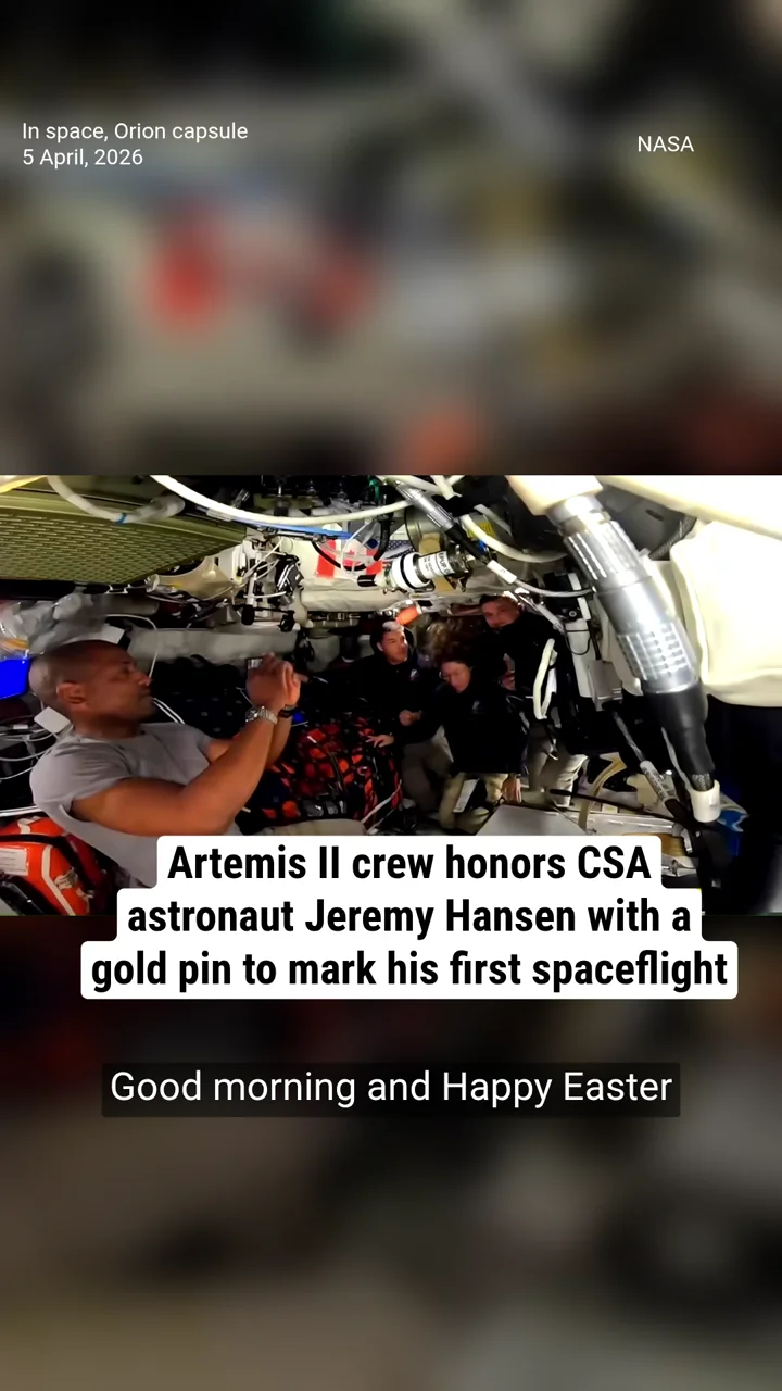 Artemis II crew honors CSA astronaut Jeremy Hansen with a gold pin to mark his first spaceflight