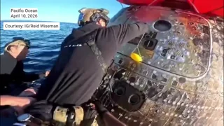 Rare footage shows Artemis II astronauts welcoming recovery team aboard Integrity moments after splashdown