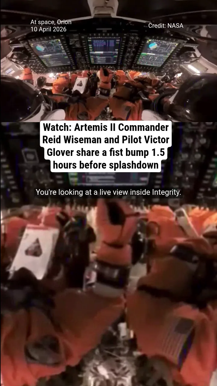 Watch: Artemis II Commander Reid Wiseman and Pilot Victor Glover share a fist bump 1.5 hours before splashdown